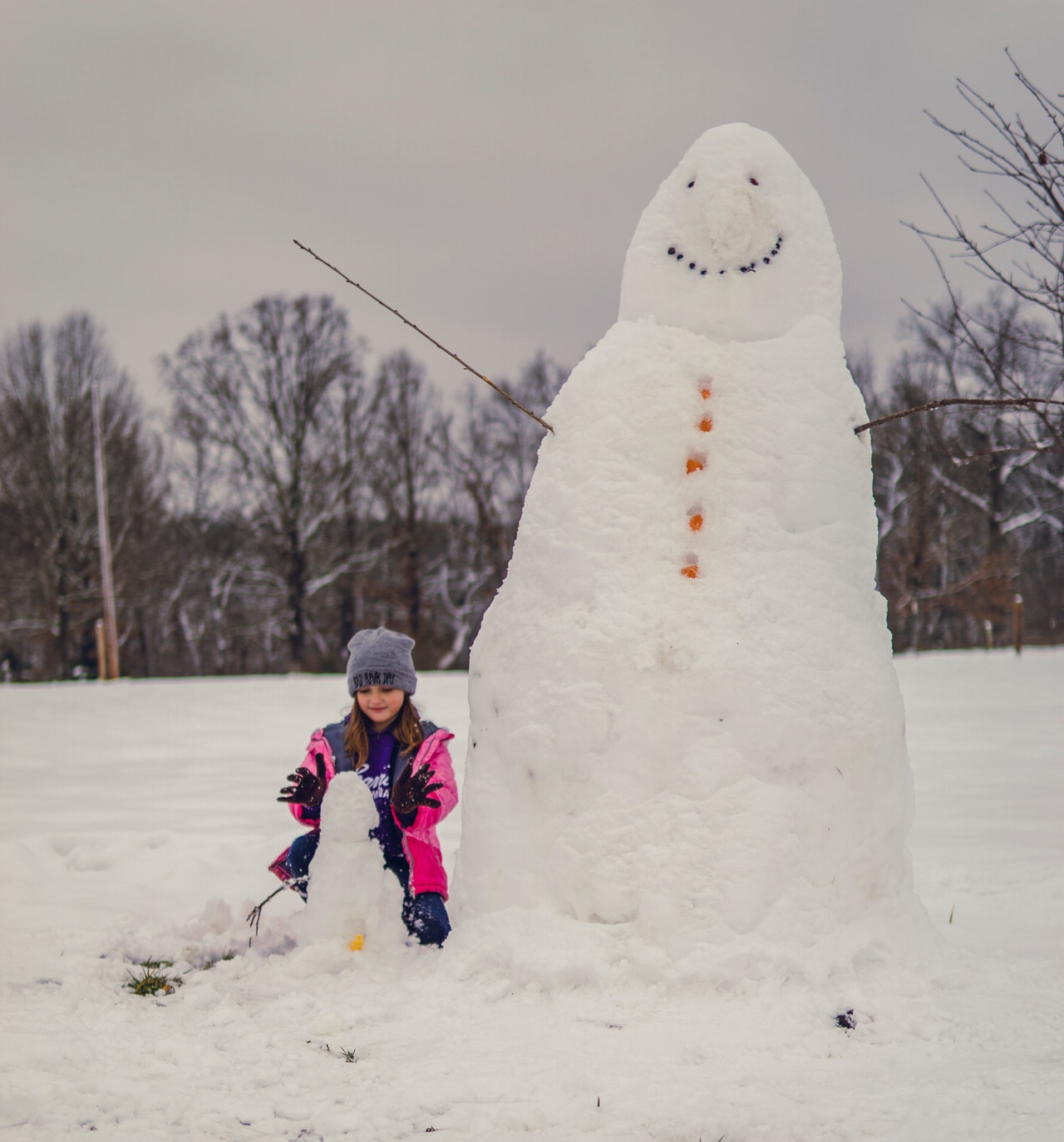 Girls with snowman