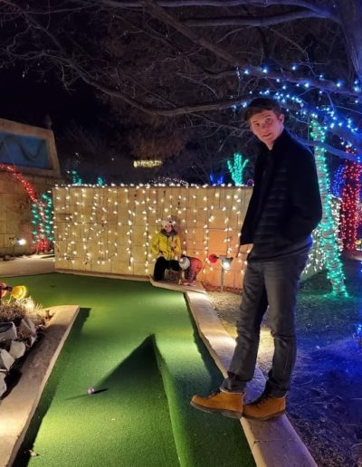 Family at Holiday Lights Mini Golf Westminster Colorado