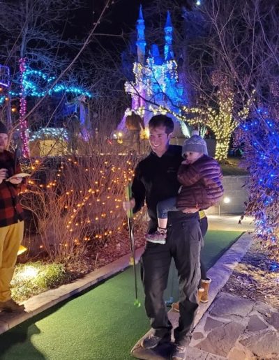 Family at Holiday Lights Mini Golf Westminster Colorado